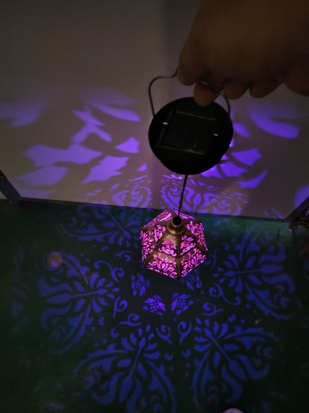 Solar iron hollow projection lamp